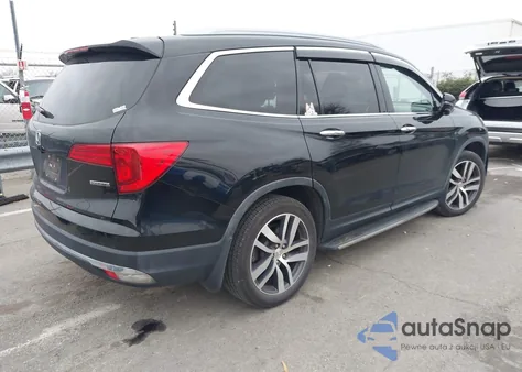 2017 Honda Pilot Touring z USA, uszkodzony, nr VIN 5FNYF5H9XHB031982